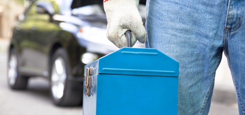 man-carrying-toolbox