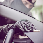 Car thief taking valuables - TrackerFit